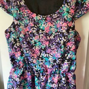 Multi-colored sleeveless shirt.